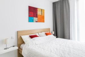 Postel nebo postele na pokoji v ubytování Baron Apartments Sušice