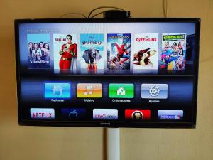 a television screen with many movies on it at Habitación Hansa in Puerto Vallarta