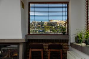 A balcony or terrace at Acropolis Eye Loft
