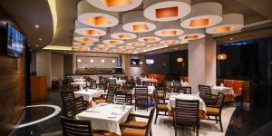 A restaurant or other place to eat at JF Grand Puebla