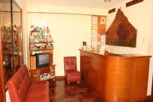 Un televizor și/sau centru de divertisment la Picol Hostal