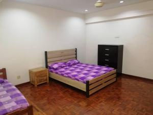 Katil atau katil-katil dalam bilik di Sweethome for travelers