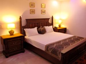 Postel nebo postele na pokoji v ubytování Skylink Suites Bed & Breakfast