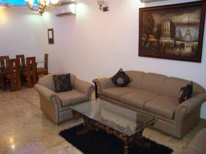 Posezení v ubytování Skylink Suites Bed & Breakfast