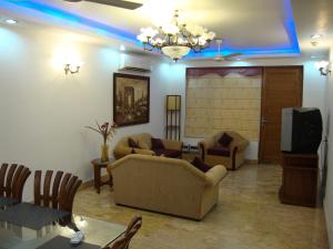 Posezení v ubytování Skylink Suites Bed & Breakfast