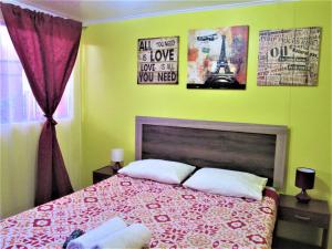 Giường trong phòng chung tại Casa TINY