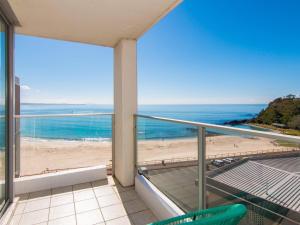 a balcony with a view of the beach at Oceanic 26 in Forster