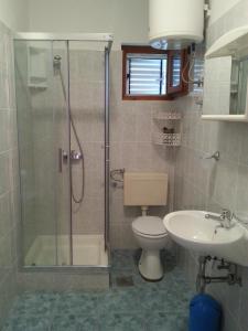 Kúpeľňa v ubytovaní Apartmani Prkačin
