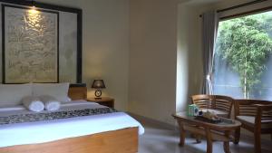 Letto o letti in una camera di Bali Jungle Resort
