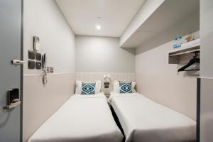MK STAY - formerly HOTEL MK 객실 침대