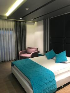 Postel nebo postele na pokoji v ubytování Oyster Boutique Hotel