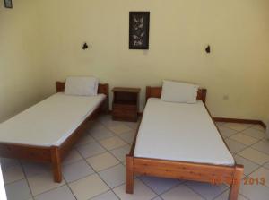 Posteľ alebo postele v izbe v ubytovaní Rigos Apartments