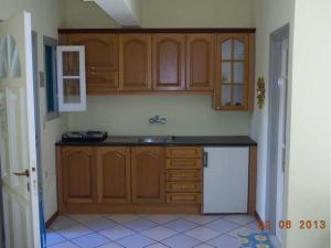 Kuchyňa alebo kuchynka v ubytovaní Rigos Apartments