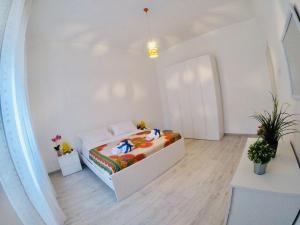 Posteľ alebo postele v izbe v ubytovaní Oudeis Holidays Apartments Tropea