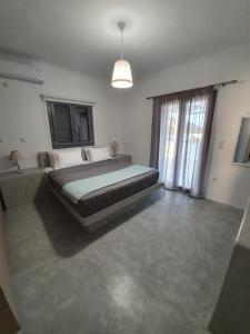 Postel nebo postele na pokoji v ubytování Villa Therme Athena