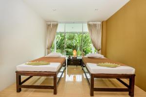 صورة لـ L'esprit De Naiyang Beach Resort - SHA Extra Plus في شاطئ ناي يانغ