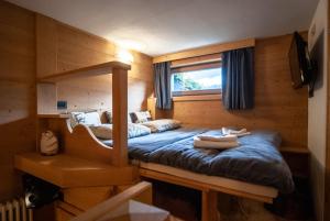 Ένα ή περισσότερα κρεβάτια σε δωμάτιο στο Mountain Loft