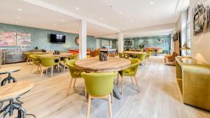 Posezení v ubytování Hotel Acropolis " Op het sportiefste park van de kust "
