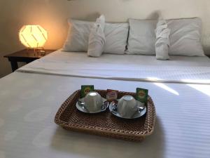 Cama ou camas em um quarto em Lukay Resort Siargao