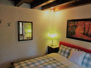 A bed or beds in a room at Relax sull'Altopiano di Asiago