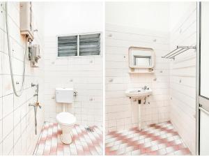 a bathroom with a toilet and a sink at D' Anjung Inn in Tangkak +37 photos