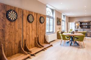 Posezení v ubytování Hotel Acropolis " Op het sportiefste park van de kust "