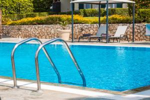 Bazén v ubytování Antonia Hotel nebo v jeho okolí