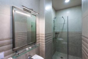 Ett badrum på Hotel Imperial House