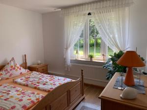 Ένα ή περισσότερα κρεβάτια σε δωμάτιο στο Landhaus Haack