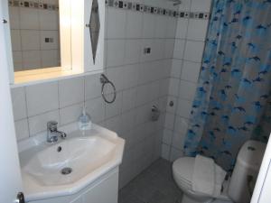Koupelna v ubytování Mandorla Apartments