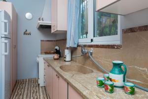 Kuchyň nebo kuchyňský kout v ubytování Saronic Seafront