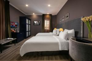 Voodi või voodid majutusasutuse Matilda Boutique Hotel & Spa toas