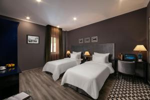 Voodi või voodid majutusasutuse Matilda Boutique Hotel & Spa toas