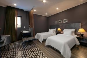Voodi või voodid majutusasutuse Matilda Boutique Hotel & Spa toas