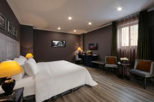 Voodi või voodid majutusasutuse Matilda Boutique Hotel & Spa toas