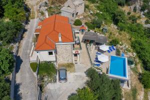 Bazén v ubytovaní Villa Makar,heated pool,gym,grill,seaview alebo v jeho blízkosti