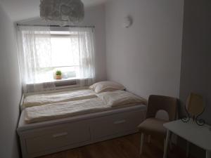 Postel nebo postele na pokoji v ubytování Pokoje gościnne Venezia