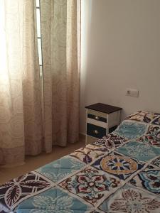 A bed or beds in a room at Primera linea del mar