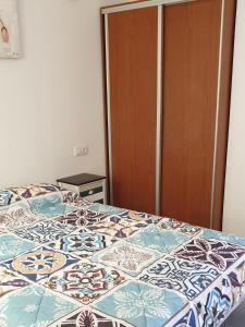 A bed or beds in a room at Primera linea del mar