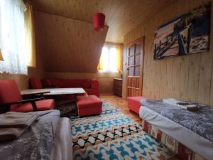 Llit o llits en una habitació de Domek Gunia