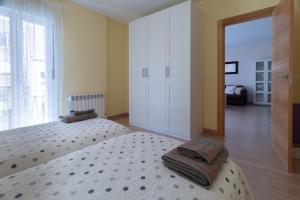 A bed or beds in a room at Río Duero 1