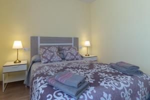 A bed or beds in a room at Río Duero 1