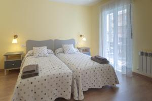 A bed or beds in a room at Río Duero 1