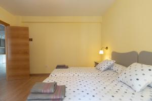 A bed or beds in a room at Río Duero 1