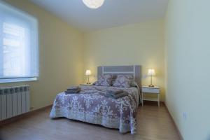 A bed or beds in a room at Río Duero 1