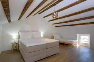 מיטה או מיטות בחדר ב-Casa Rustica