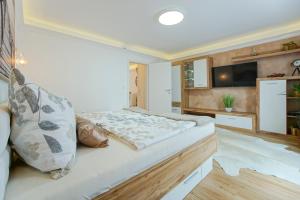 Postel nebo postele na pokoji v ubytování Auszeit Leoben 3 mit Gartenterasse und Gratisparkplatz