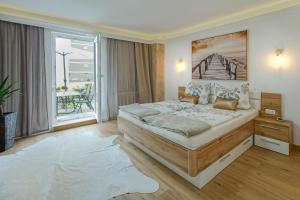 Postel nebo postele na pokoji v ubytování Auszeit Leoben 3 mit Gartenterasse und Gratisparkplatz
