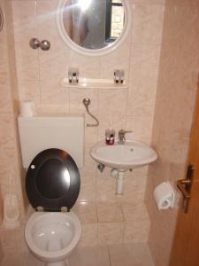 Koupelna v ubytování Rooms Roso