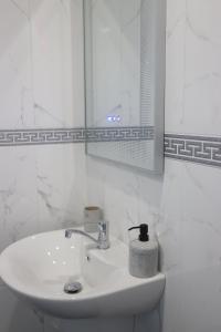 Koupelna v ubytování Prity Sport Botique Hotel + 24 fotografií